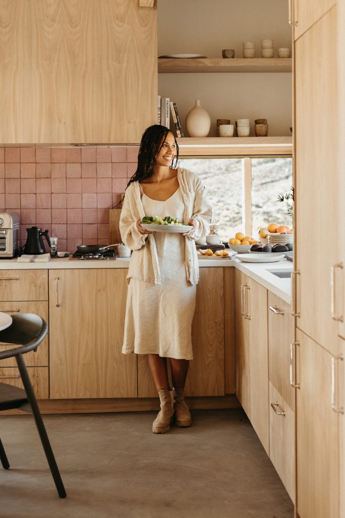 Woman cooking in kitchen.