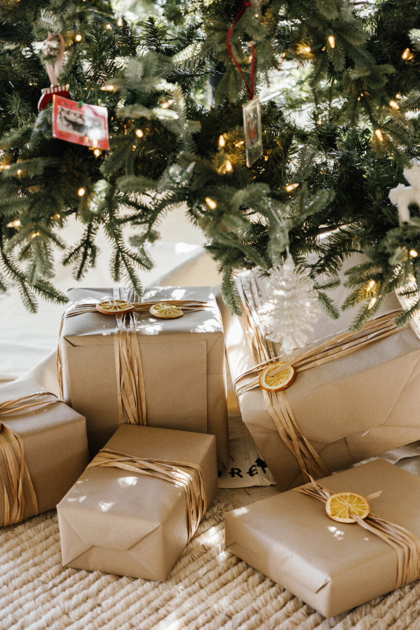Camille Styles Holiday Decor 2023-Christmas tree with kraft paper presents and dried citrus-rustic gift wrapping