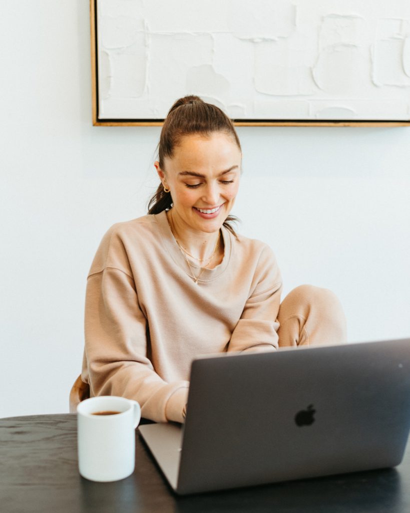 Woman working on computer.