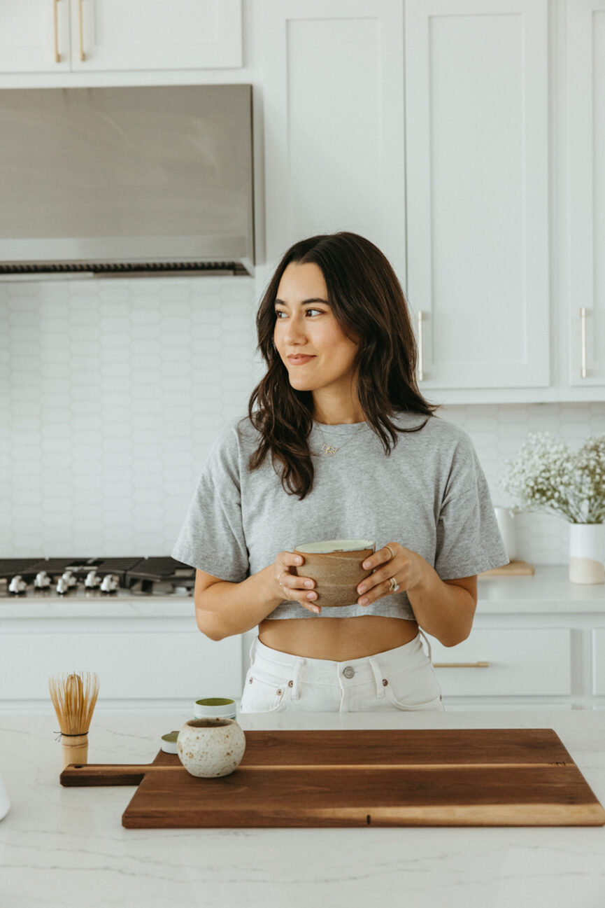 Woman drinking matcha.