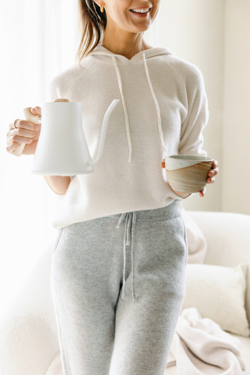 Woman pouring tea.