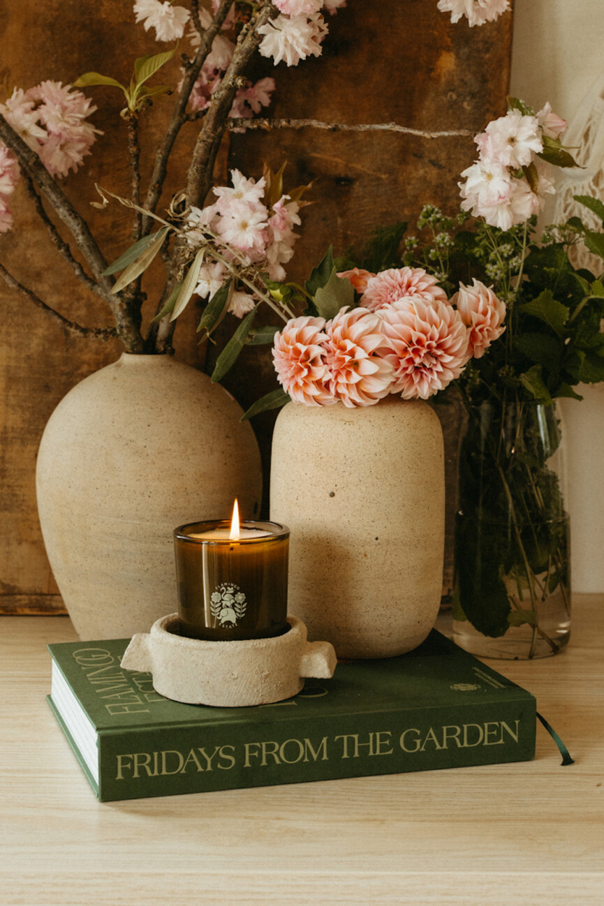 Candle and books.