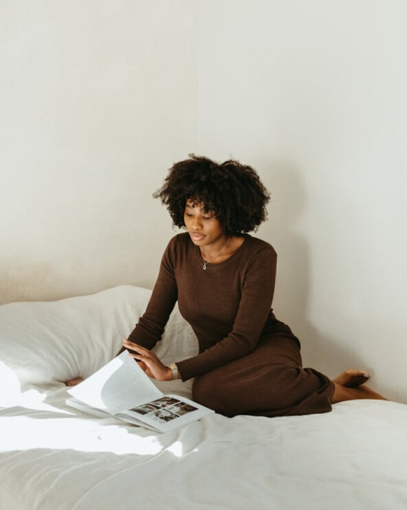 Woman reading in bed.