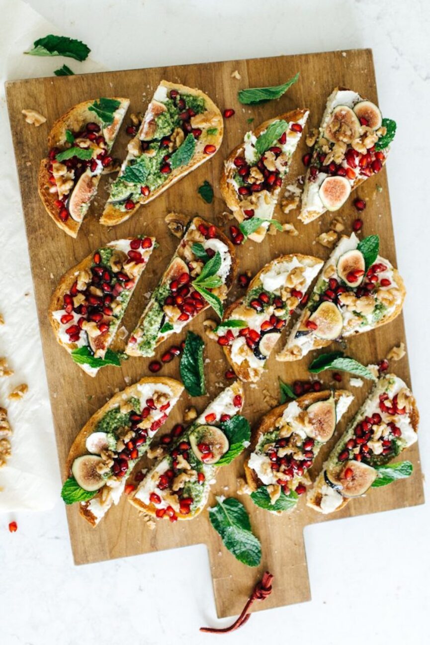 burrata toasts with caramelized walnuts and mint-pomegranate pesto