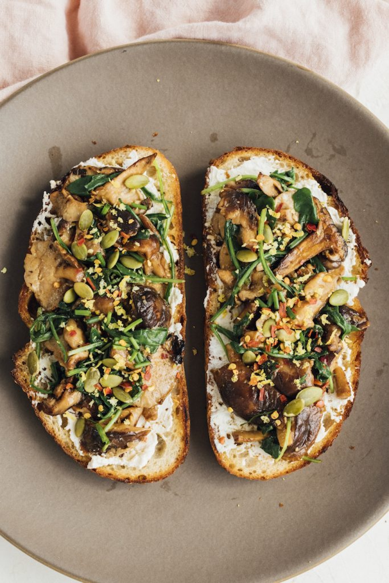 mushroom toast with arugula and lemon