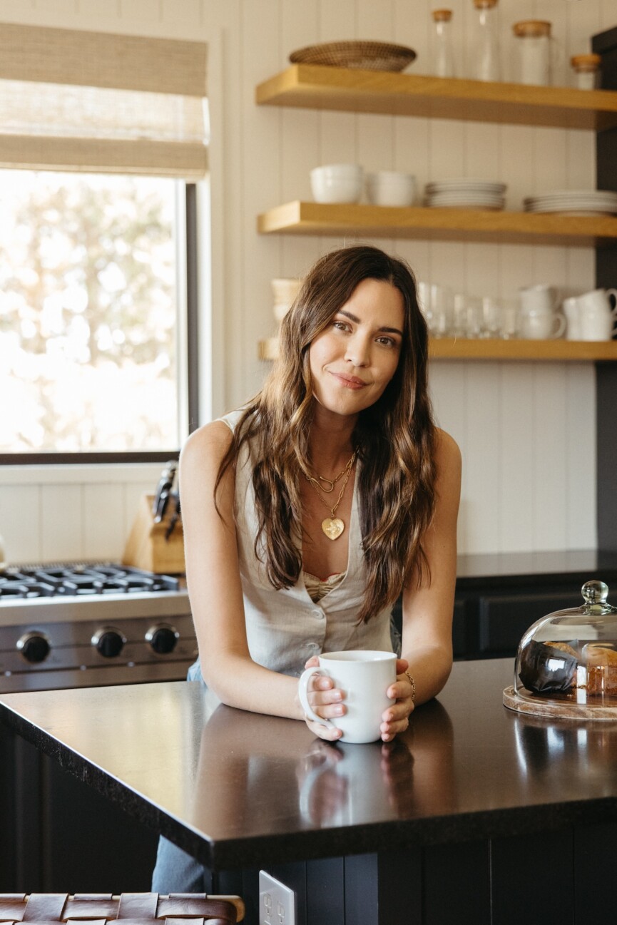 woman with tea in the kitchen