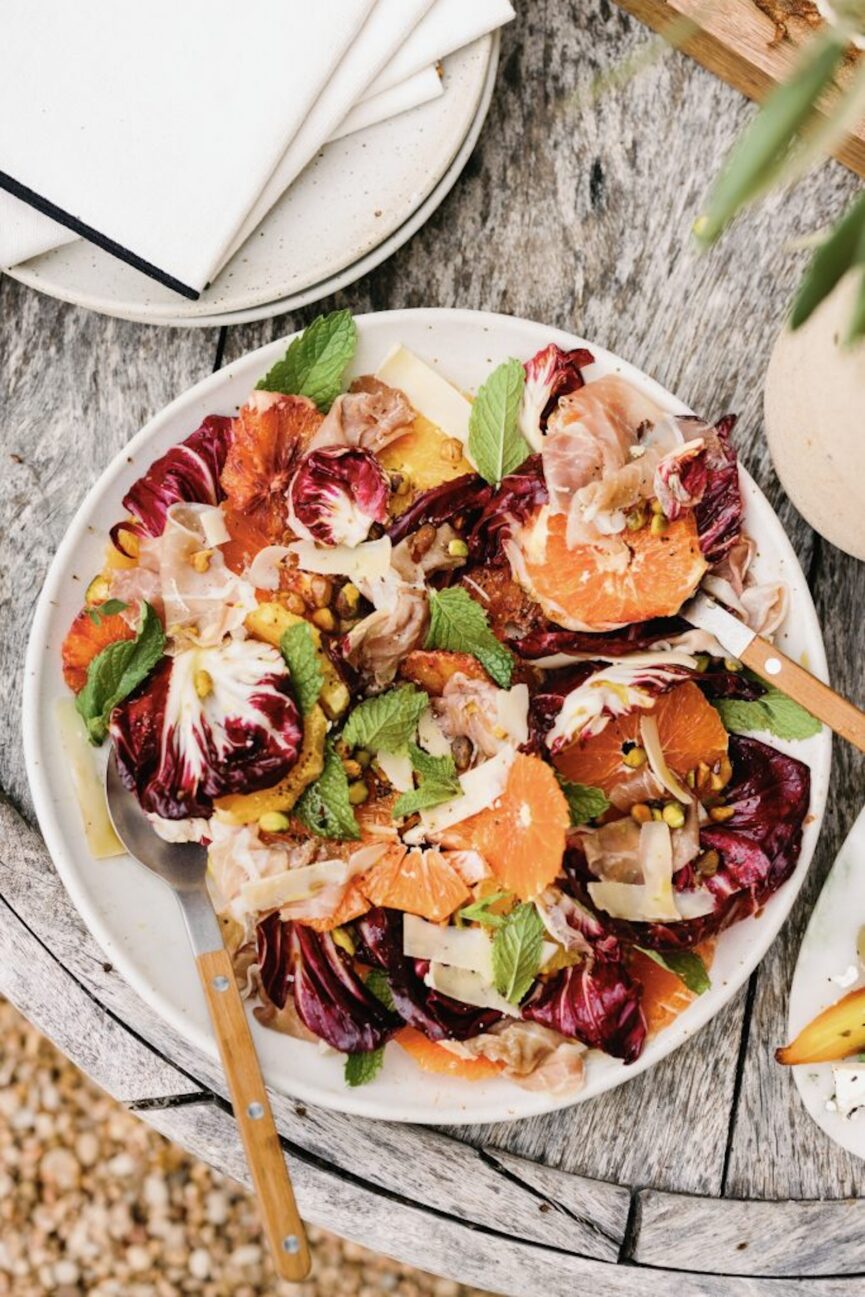 bitter greens citrus, and proscuitto salad