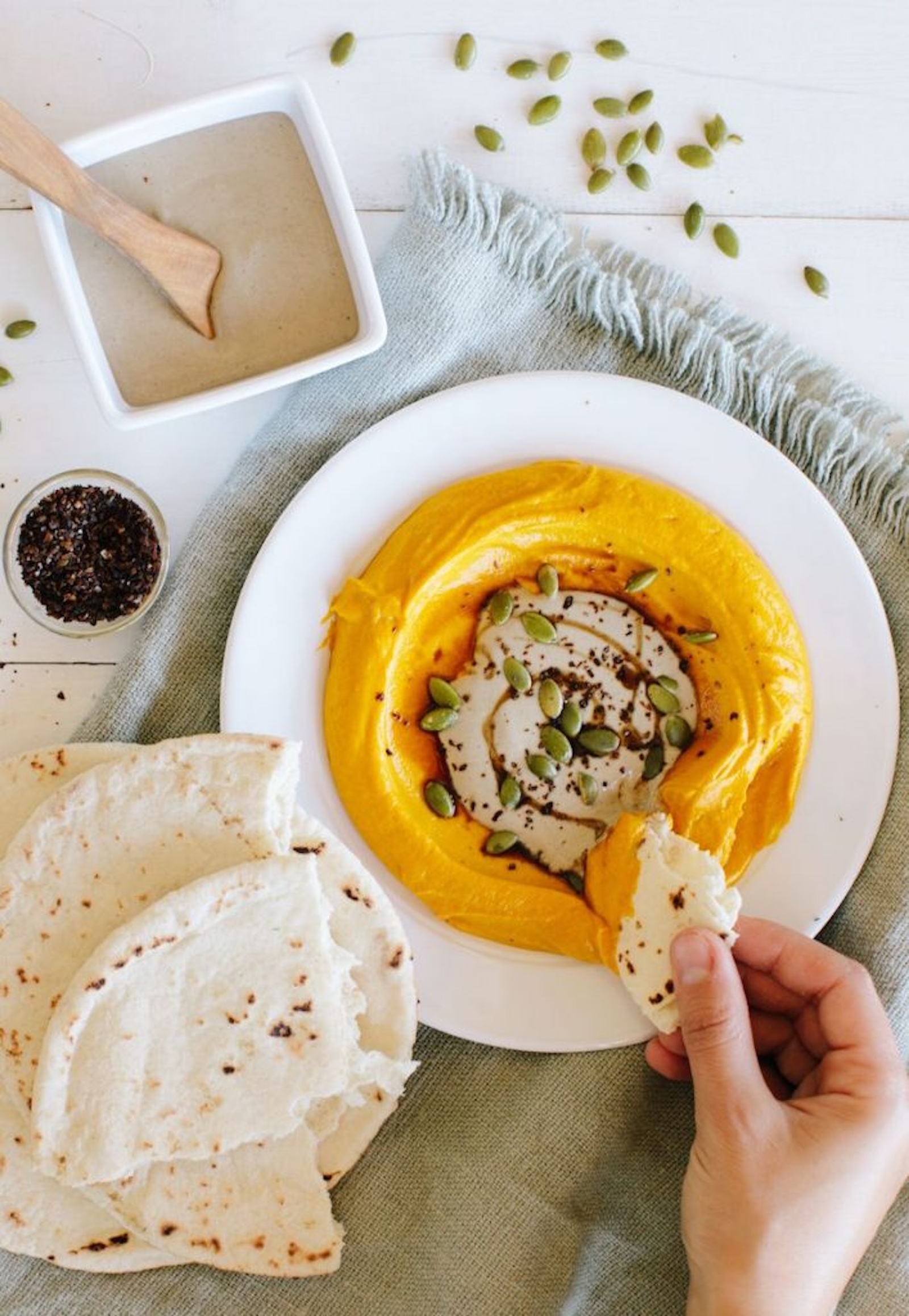 squash hummus with whole tahini and pumpkin seeds