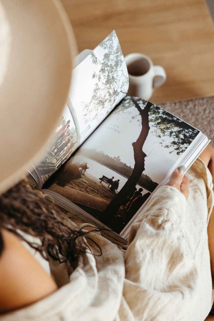 Woman reading design book.