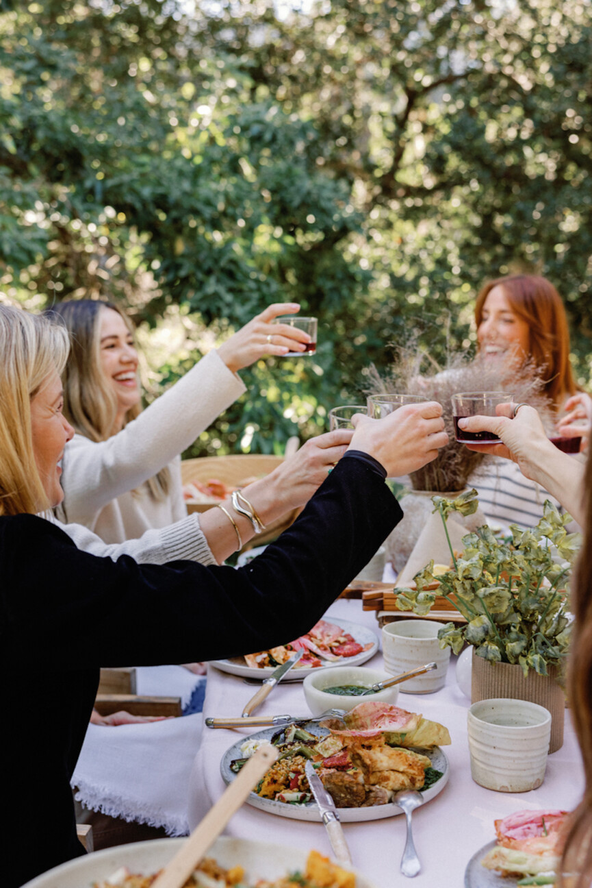 Women cheering wine.