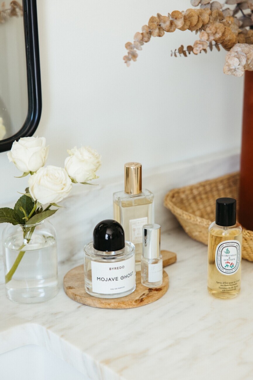 Perfume on nightstand.