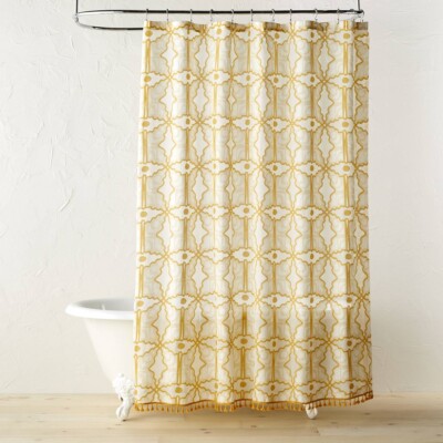 Butterfly print yellow shower curtain with a tub from Target