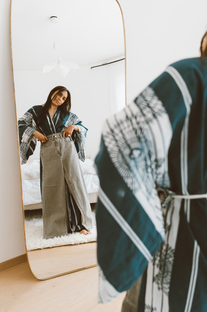 Woman trying on clothes.