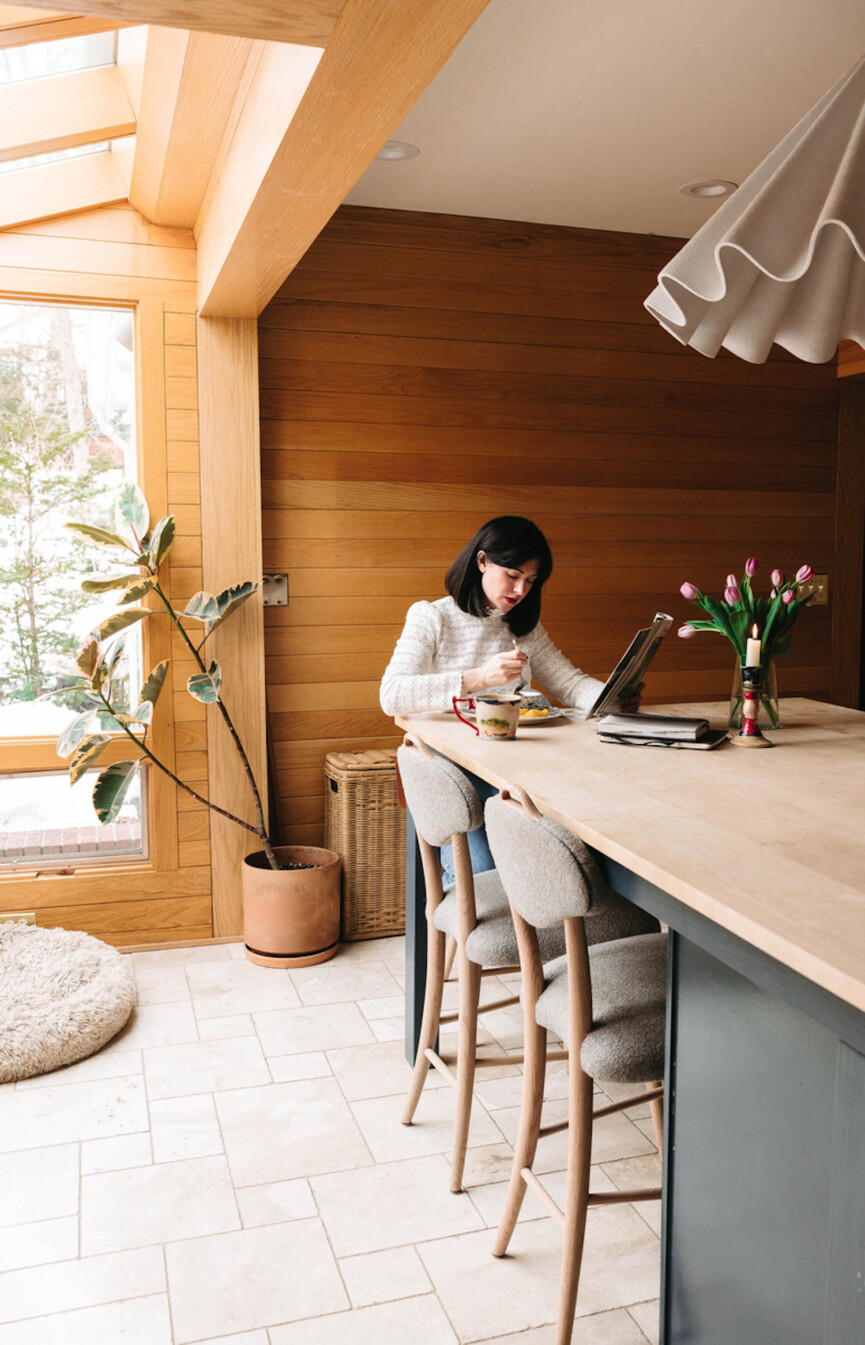 Woman typing at computer.