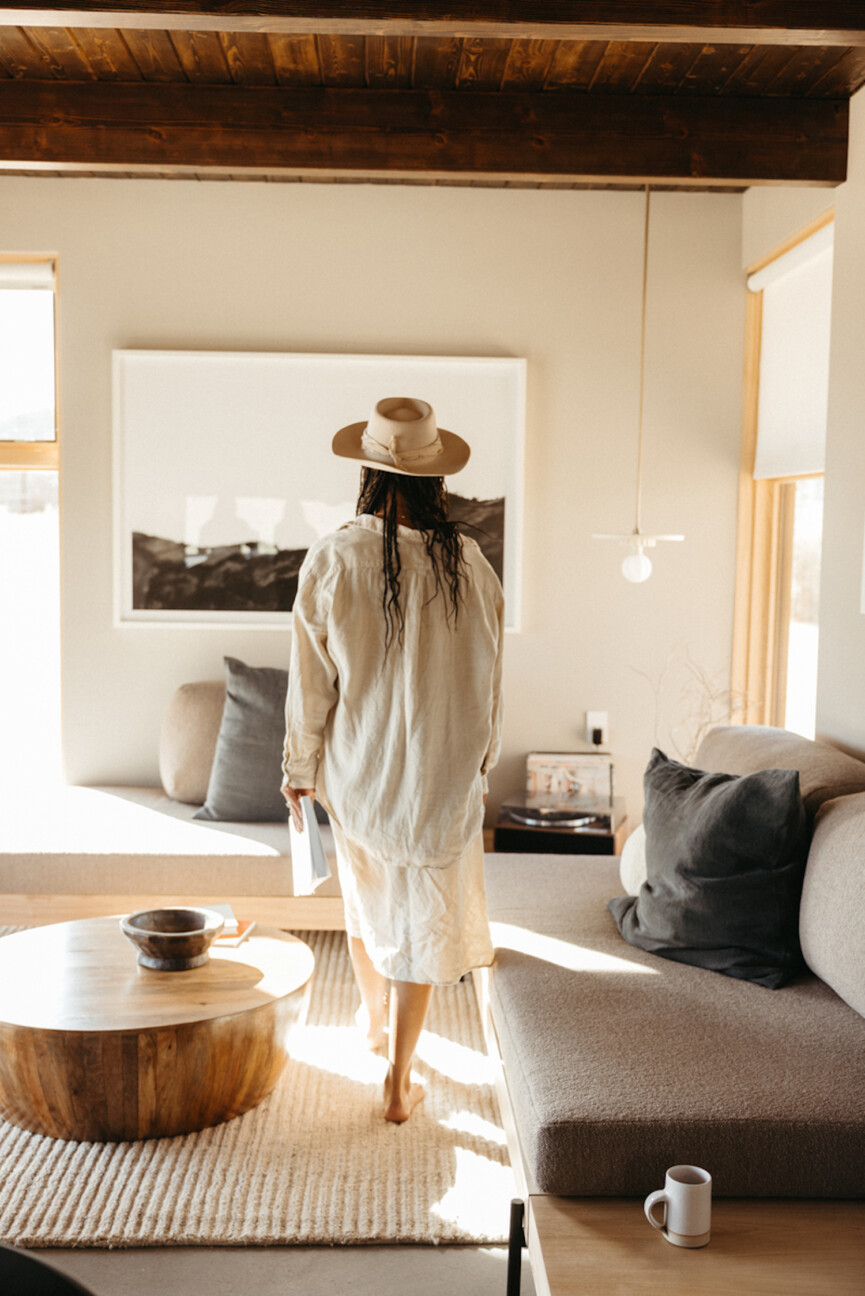 Woman walking in Joshua tree home.