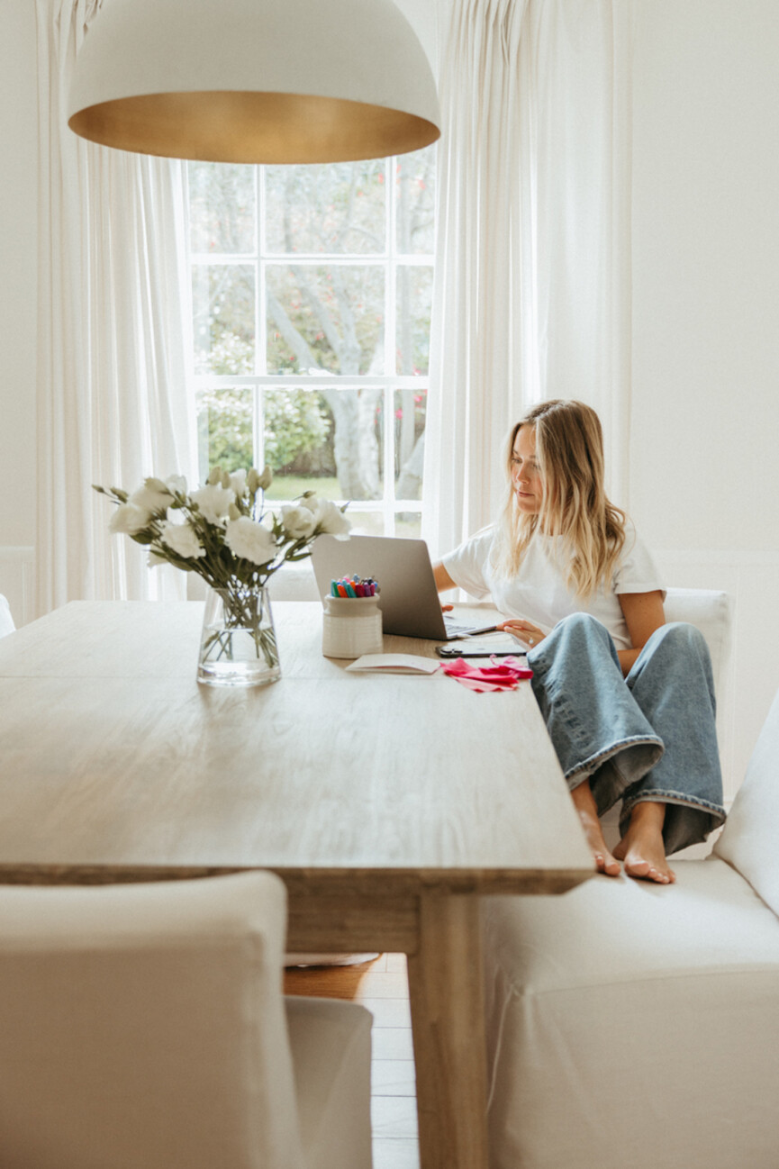 Woman working on computer.