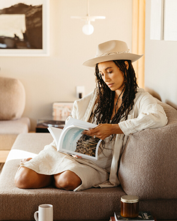 Woman reading best beach reads of 2024.