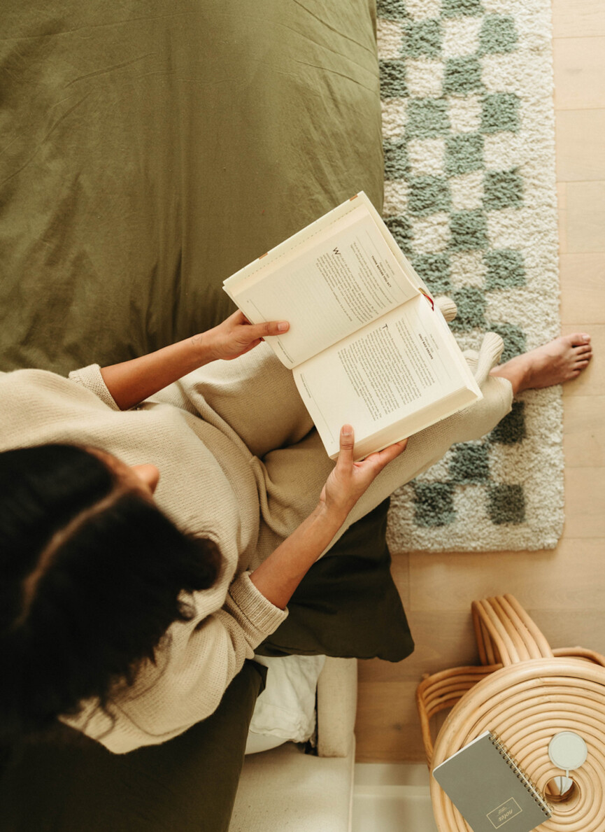 Woman reading book.