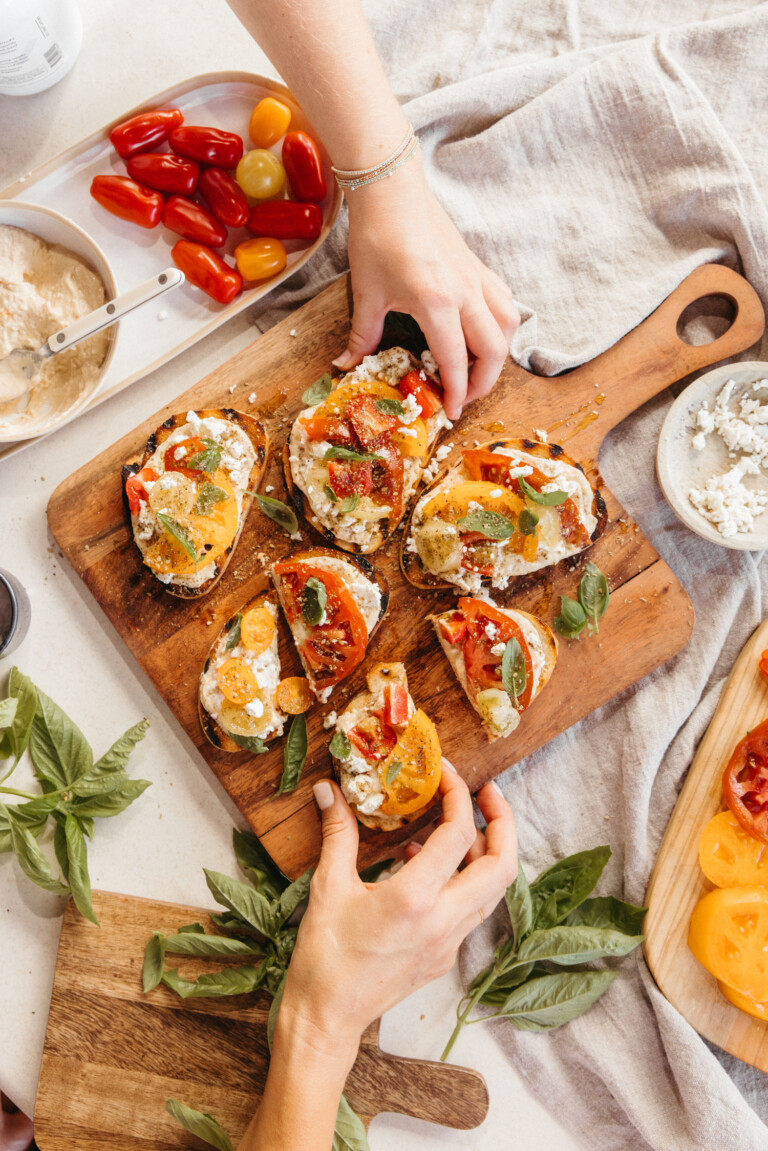 hummus toast with tomatoes, feta, and za'atar_outdoor dinner party menu ideas