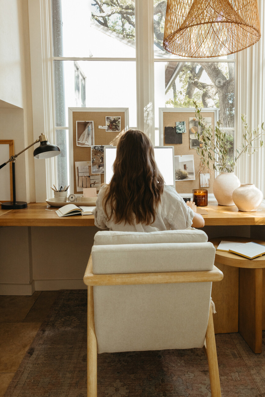 Woman writing at desk
