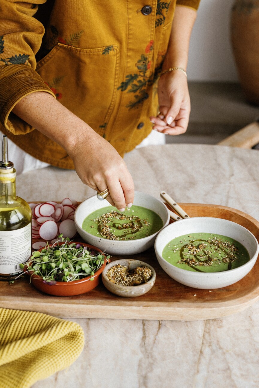 placing toppings on spring pea gazpacho