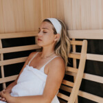 Janessa Leoné using full-body red light therapy.