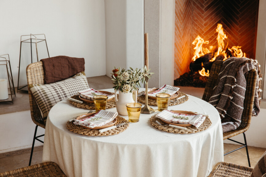warm table setting with fireplace
