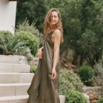 Camille Styles wearing long green dress
